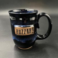 Handmade Black and Blue Ceramic “Huzzah” Mug