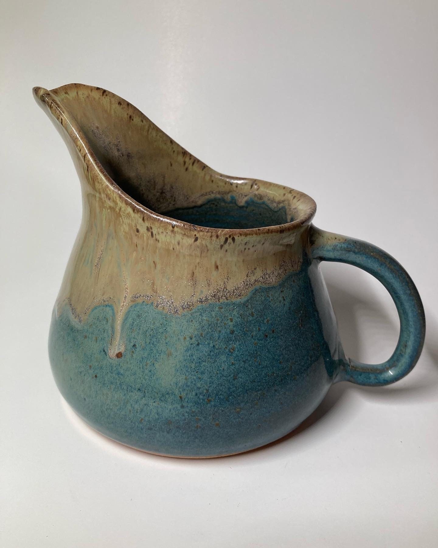 Small handmade ceramic pitcher