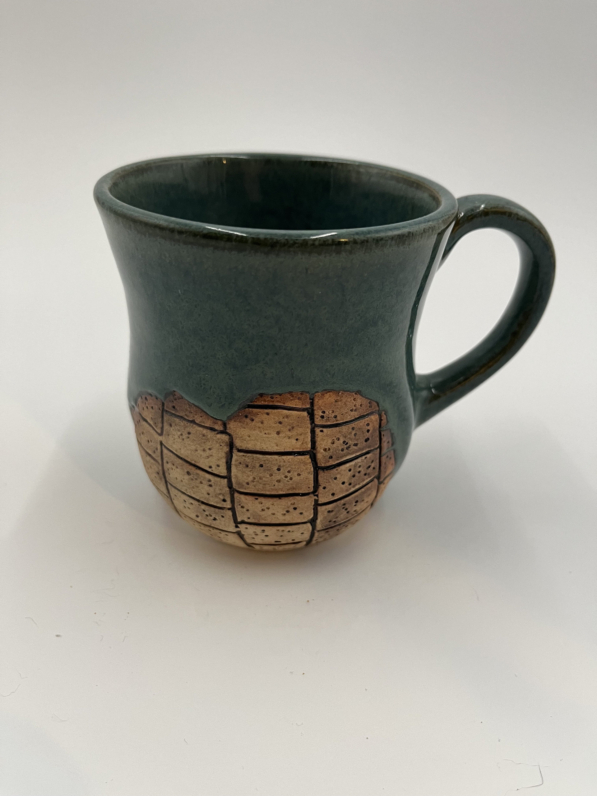 Handmade Blue and Green Mug with Carved Bricks