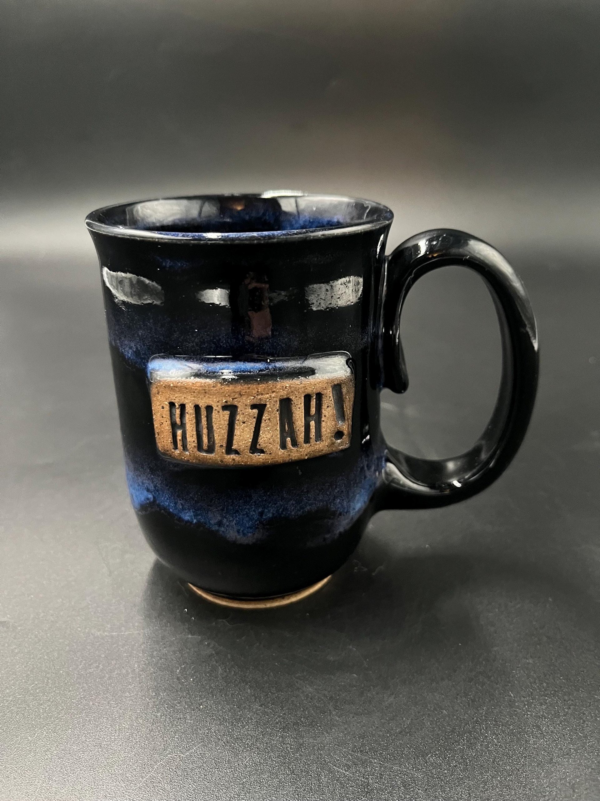 Handmade Black and Blue Ceramic “Huzzah” Mug