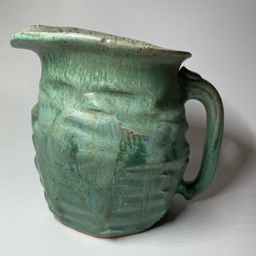 Chunky green ceramic pitcher
