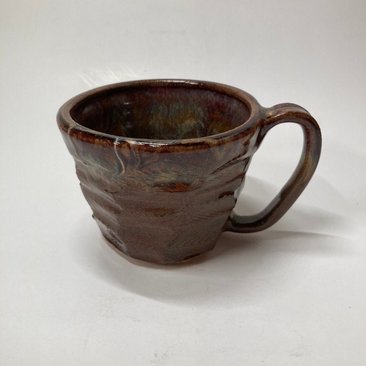 Handmade carved burgundy brown ceramic mug
