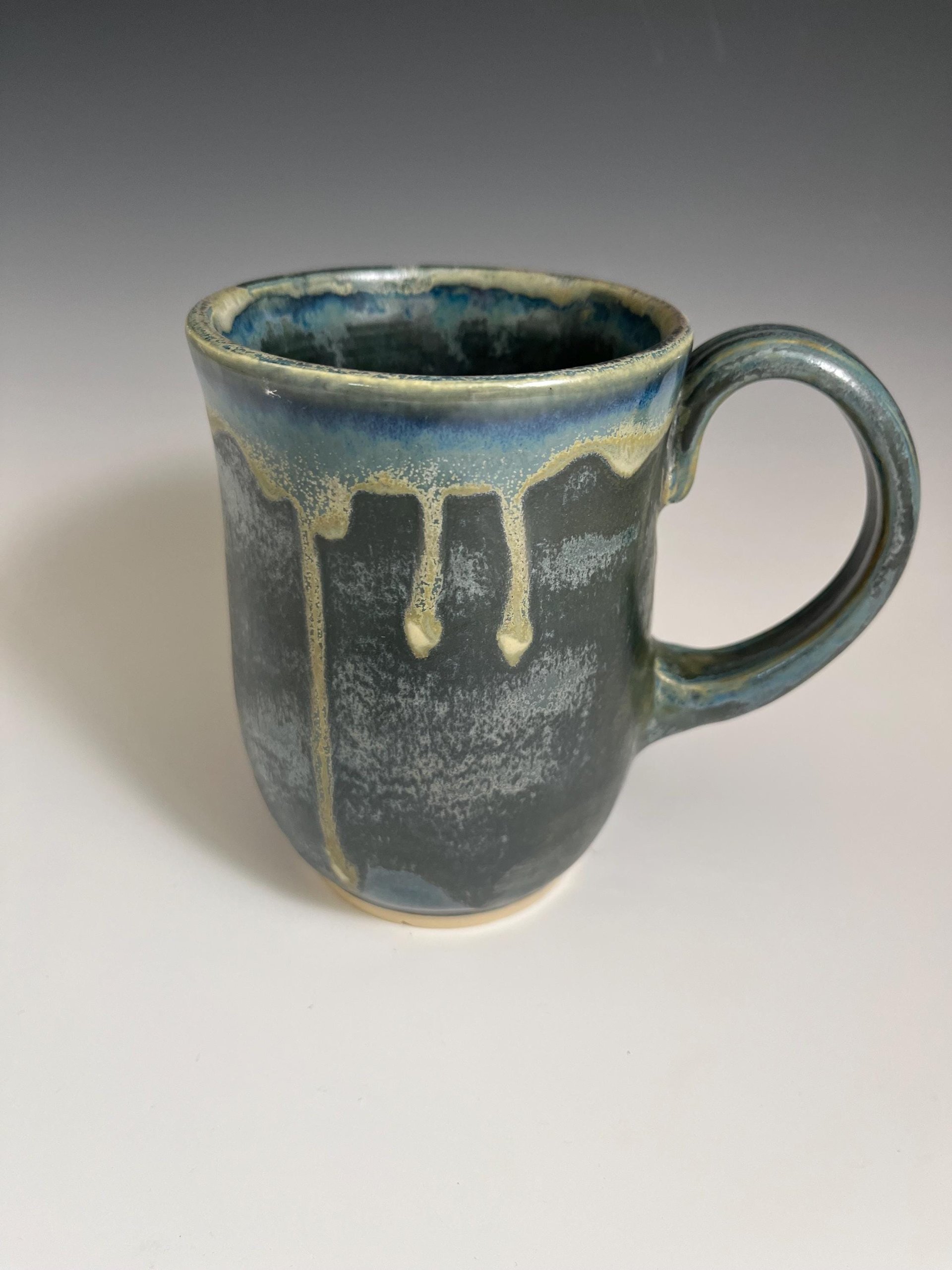 Handmade Ceramic Green Mug with a golden dripping rim