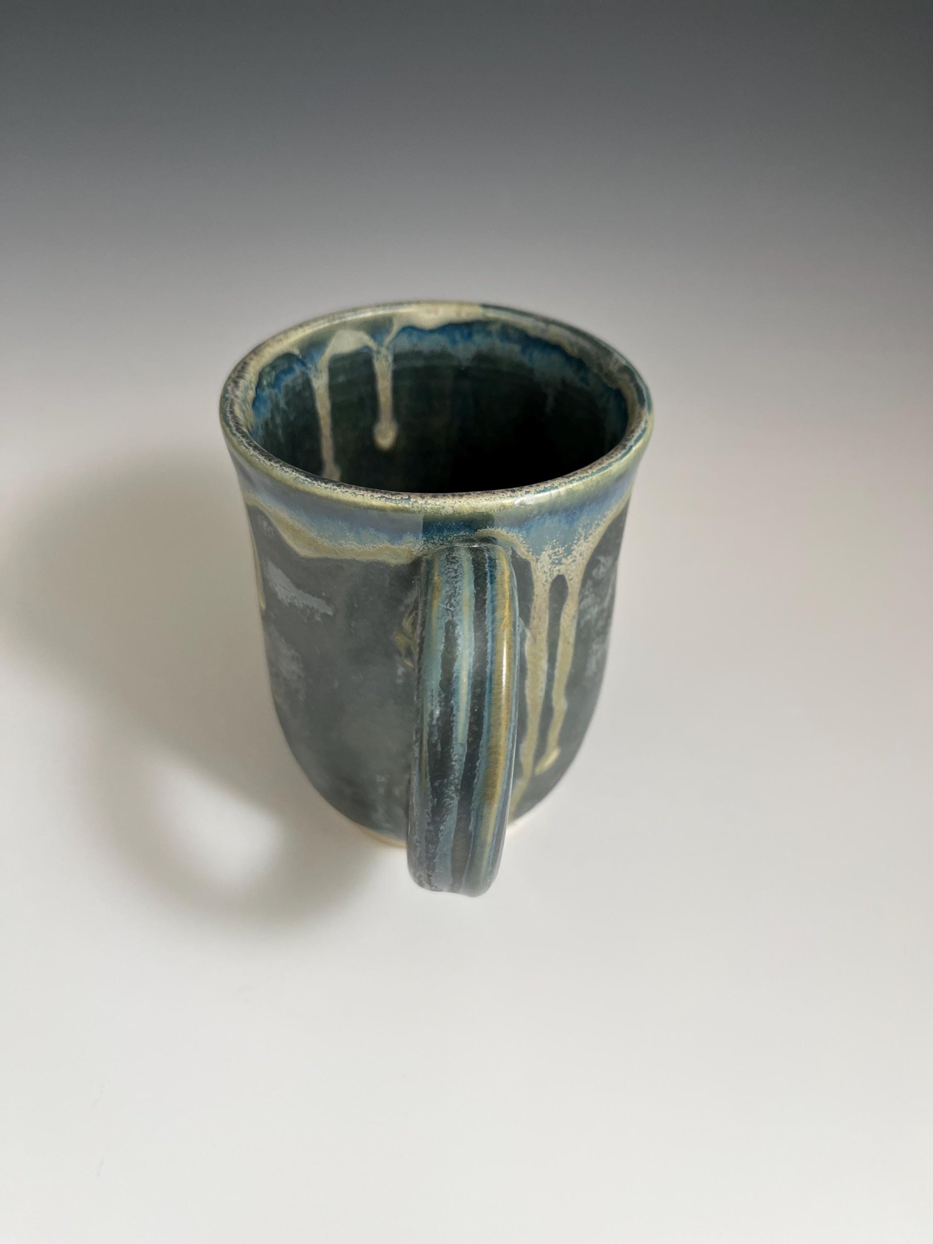 Handmade Ceramic Green Mug with a golden dripping rim