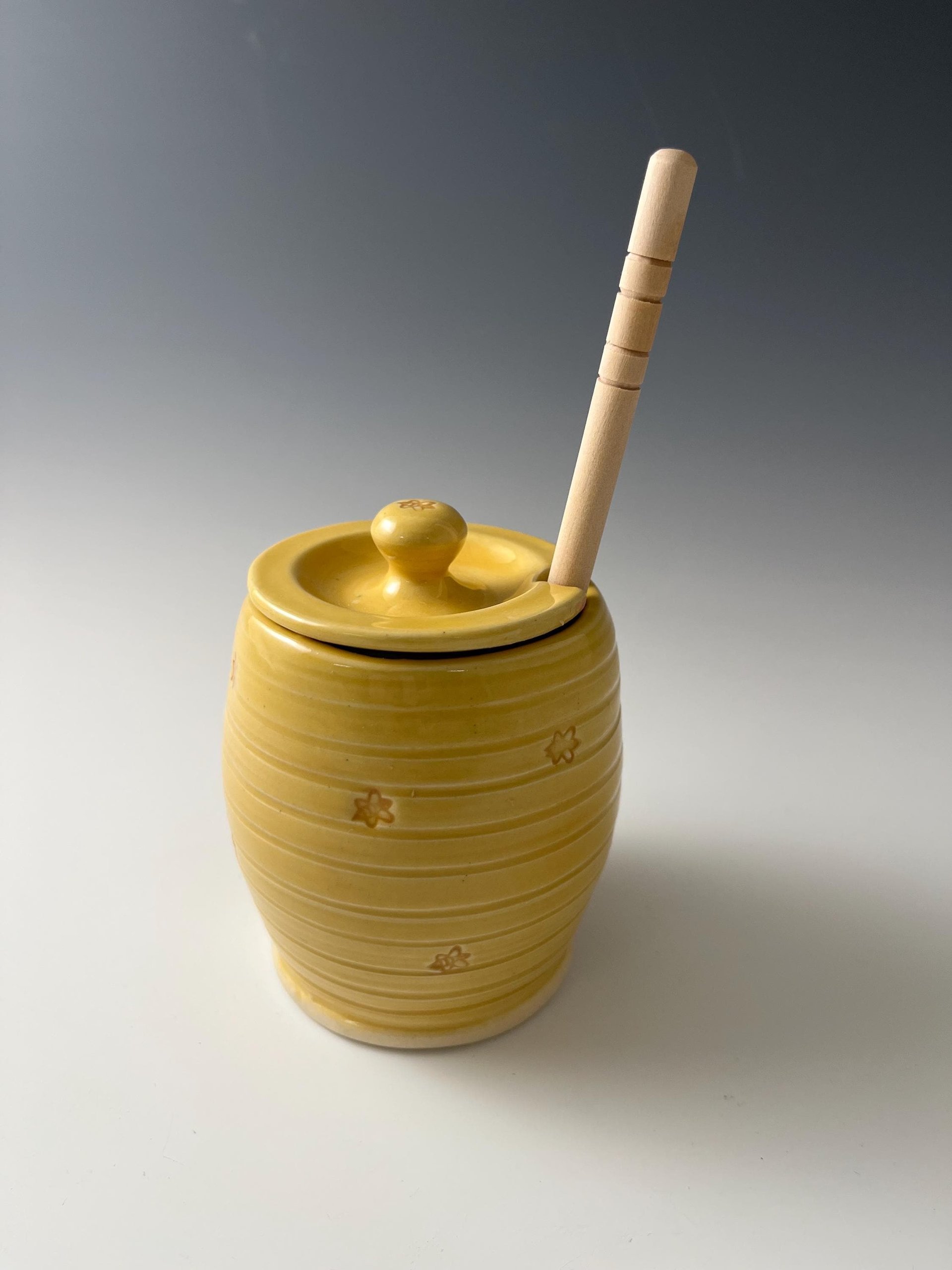 Handmade Ceramic Honey Jar - vibrant yellow with a bee design