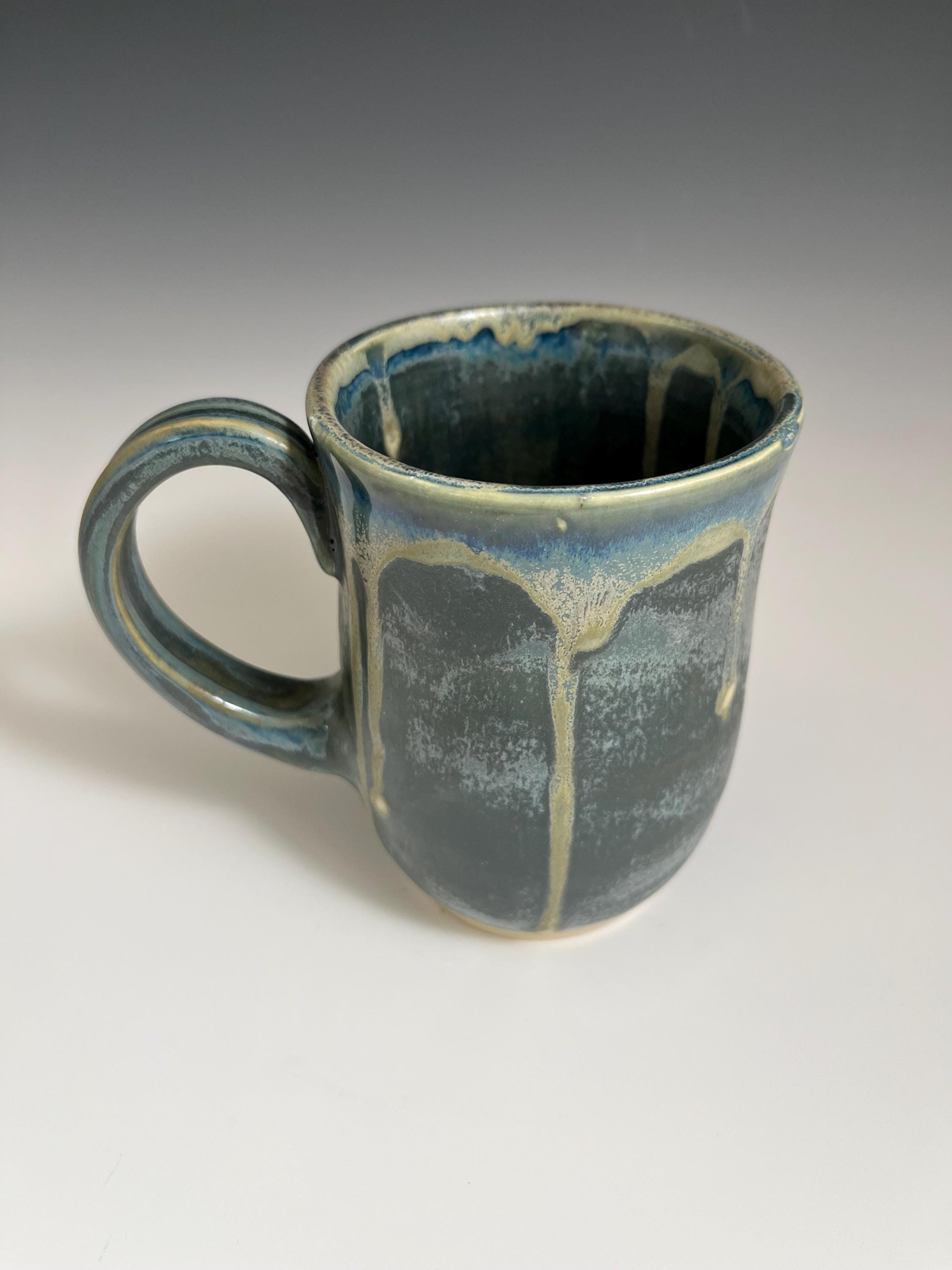 Handmade Ceramic Green Mug with a golden dripping rim
