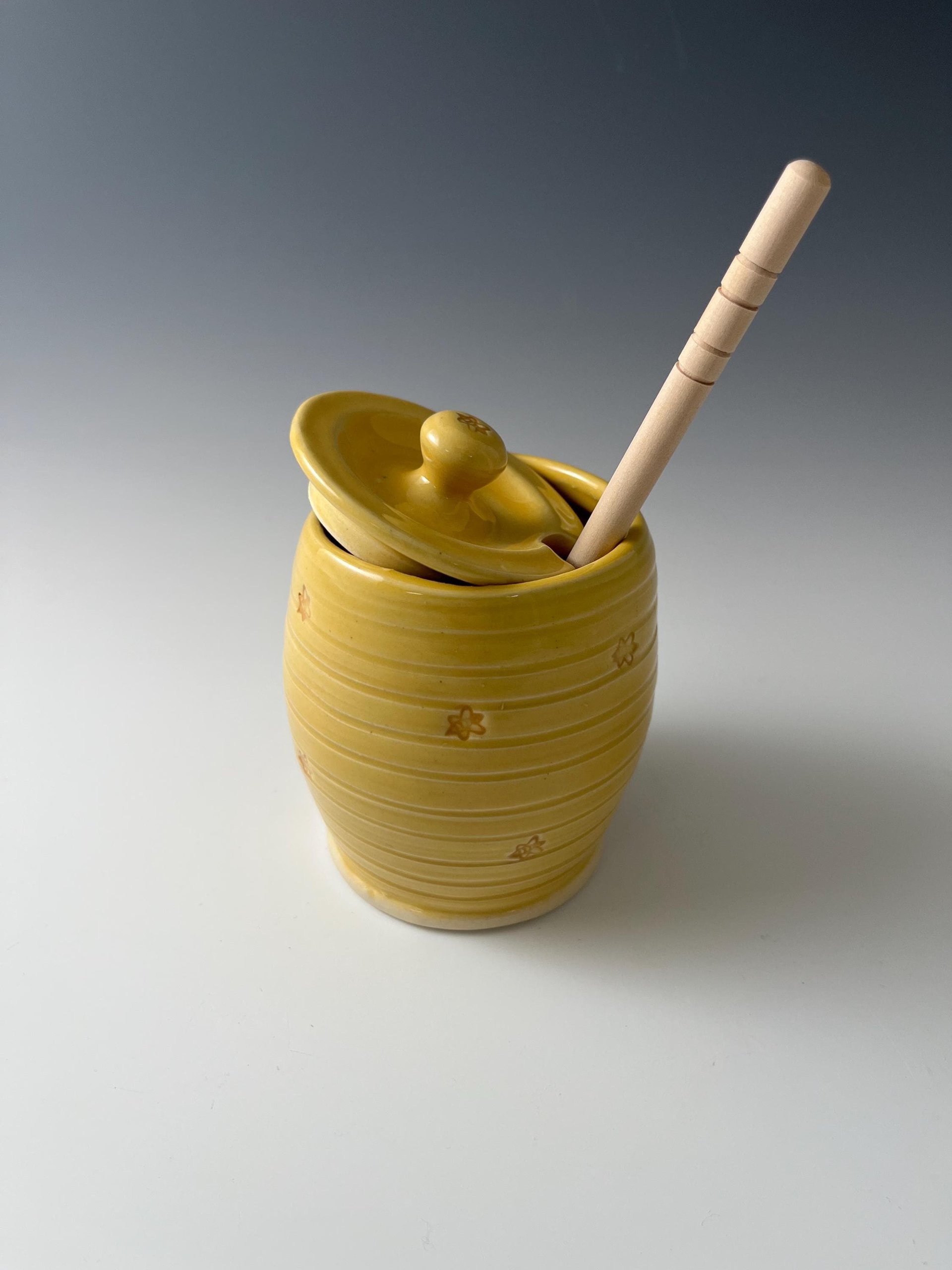 Handmade Ceramic Honey Jar - vibrant yellow with a bee design